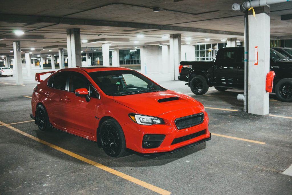 red subaru sports car parked